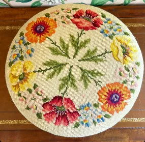 Fabulous hand stitched needlepoint round small footstool.